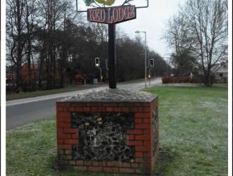 Village Sign on a brick plinth